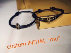 GELANG INITIAL BRONZE\nGELANG COUPLE MAGNET INITIAL BRONZE SEPASANG (2PCS)