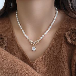 Zhuji natural freshwater pearl necklace for women stylish and elegant with a wing pendant unique design sweater chain