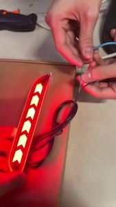 Universal Retro Cafe Racer Motorcycle Seat Vintage Hump Saddle Custom Bike Brake Light Assemblies Red Arrow LED Lights.
