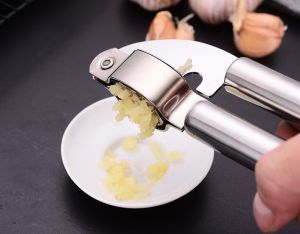 Alat Penghancur Bawang Putih Stainless & Pembersih Rumah