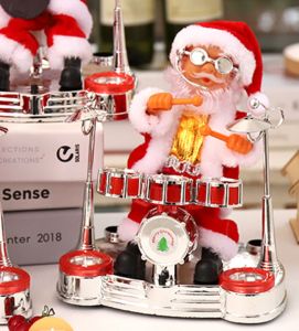 Đồ chơi ông già noel đánh trống thổi kèn đánh đàn chơi guita chui ống khói tặng pin