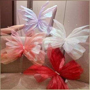ผ้าตกแต่ง ดอกไม้เส้นด้ายสามมิติ ตกแต่ง ผีเสื้อไข่มุกแฟนตาซี ความดึงดูดสายตา หรูหรา ในสถานที่