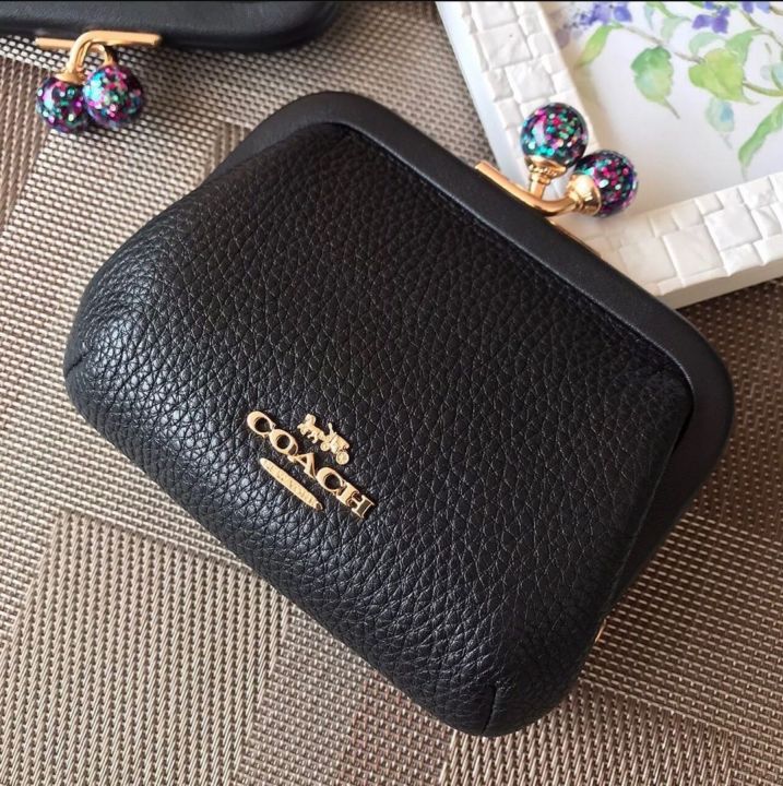 Was this version of the kisslock coin purse sold in asian markets only? : r/ Coach