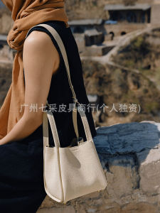 Son Small to medium-sized tote bag suitable for commuting can be carried on the shoulder or crossbody made of genuine leather large capacity bucket bag style for women