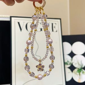Thanh lịch và sang trọng thạch anh tím và ngọc trai dây xích điện thoại với một xoay mặt dây chuyền một độc đáo và understated phụ kiện cho túi xách và chìa khóa