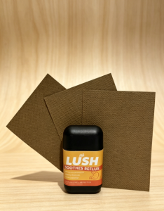 LUSH Inhalable Wellness Stick Soothes Reflux Inhaler - Daily care for indigestion and heartburn relief.