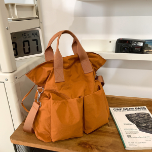 กระเป๋าสะพายข้างผู้หญิง กระเป๋าสะพายข้างเดินทางความจุขนาดใหญ่ กระเป๋าลําลองสําหรับชั้นเรียนแบบพกพา