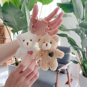 ตุ๊กตาหมีร้อยสร้อยข้อมือถุงกระเป๋าเล็กน่ารักพวงกุญแจรูปสัตว์นุ่มนิ่มพวงกุญแจจี้น่ารักสำหรับกระเป๋าเป้กระเป๋ากระเป๋าเงิน