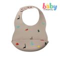 Peekaboo Silicone Bib – Dino Tan. 