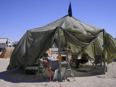Parabolic Tent Microfiber 40 Leaves - 50ft Diameter colorful striped design outdoor event setup suitable for gatherings and parties.