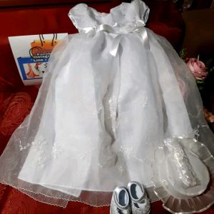 Baptismal gown girl (Combo #4) . This includes a baptismal gown. cap pair of shoes headband and mini rosary crystal beads.