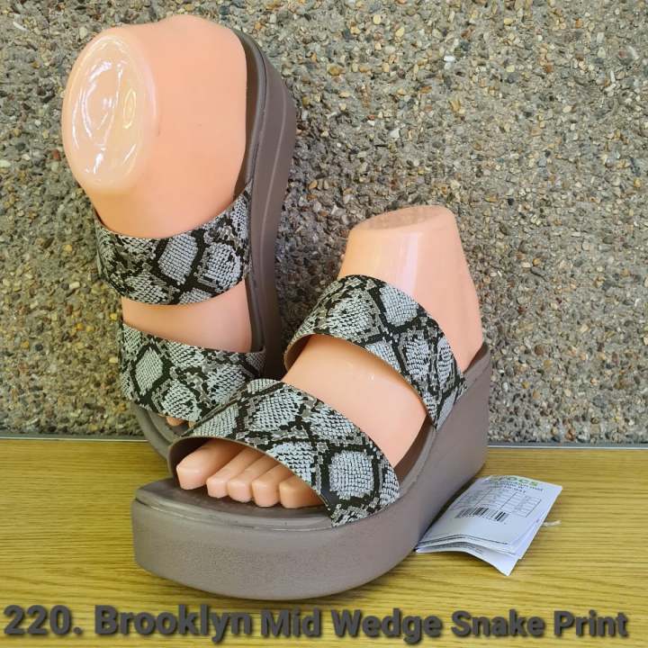 ONHAND Authentic Crocs 220. Brooklyn Mid Wedge Snake Print Women