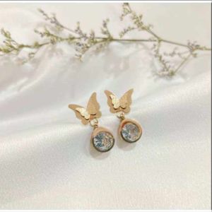 Anting Tusuk Titanium Kupu-Kupu Permata CXB488