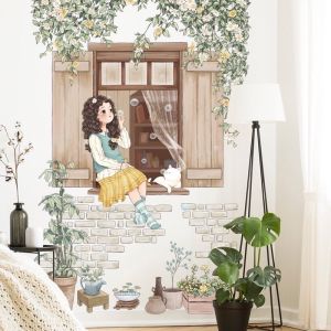Decal dán tường phong cách hàn quốc cô gái ngồi bên cửa sổ