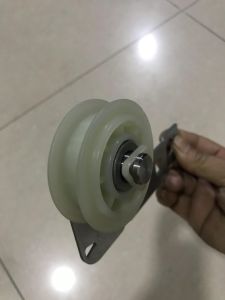 Bánh tỳ căng dây curoa máy sấy Whirlpool