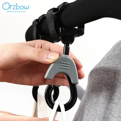 Orzbow ตะขอถุงผ้าอ้อมรถเข็นเด็กทารกแบบหมุนได้360 ° องศาคลิปห่วงห้อยกระเป๋าช้อปปิ้งรถเข็นเด็กของเด็กที่แขวนรถเข็นเด็กอุปกรณ์เสริม2ชิ้น