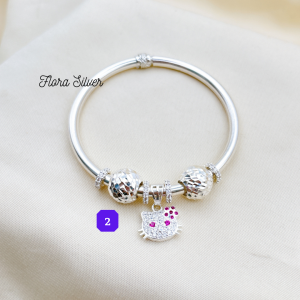 FLORA 0450C - Vòng tay bạc ta mix hình quả cầu phay kim tiề n mix charm hình mèo Hello Kitty dành cho bé gái