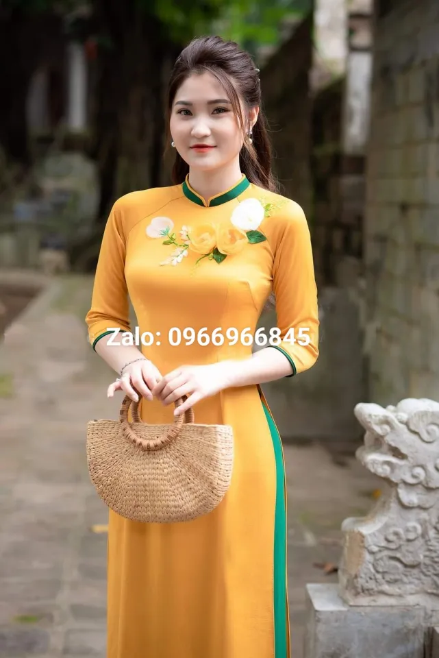 Áo dài màu vàng lụa cao cấp mềm mịn đính hoa nổi mặc dự tiệc cưới