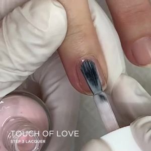 Dazzle Dry Nail Lacquer (Step 3) - Touch of Love - A semi-sheer pale chalky pink. (0.5 fl oz)