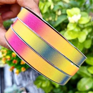 ริบบิ้นกากเพชรใสสีรุ้ง ตรา TW ม้วนเล็ก ยาว 30 หลา ขนาด 12 mm. พับเหรียญโปรยทาน เนื้อนิ่ม (ราคาต่อม้วน)