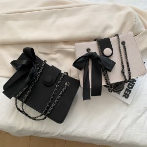 Túi Xách Nữ Đeo Chéo Thắt Nơ Sành Điệu Có Khoá Kéo Hàng Quảng Châu QH589