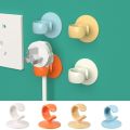 DOUBLEL Nail-free Plug Hook Non-marking Wall Adhesive Plug Storage Holder Multifunctional Plastic Power Plug Holder for Home. 