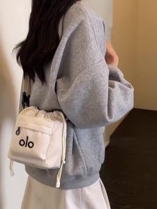 alo Crossbody bag womens handbag bucket bag fashionable and lightweight shoulder bag drawstring closure phone bag small crossbody bag