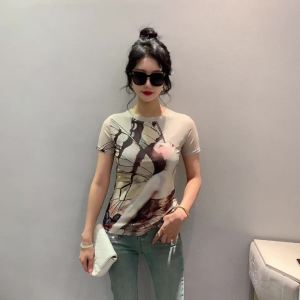 Ammin เสื้อยืดคอกลมแขนสั้นมีระบายสำหรับผู้หญิงเสื้อสง่างามแบบลำลองขนาดใหญ่พิเศษพิมพ์ลายการ์ตูนแฟชั่นฤดูร้อน2024