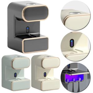 HCHC MALL Wall Mounted Electric Toothpaste Dispenser UV Ultraviolet 3 Toothbrushes Slots Automatic Toothpaste Squeezer Durable Construction Multi Functional Toothpaste Tube Stand Bathroom Use