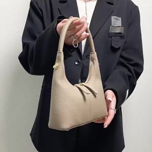 Leather womens bag 2023 Spring collection niche design handbag elegant style small bag versatile crescent-shaped womens bag