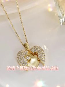 AE Dây chuyền xương quai xanh hình trái tim bằng thép titan phổ biến của Châu Âu và Mỹ dành cho nữ trang sức thời trang mặt trái tim sành điệu.