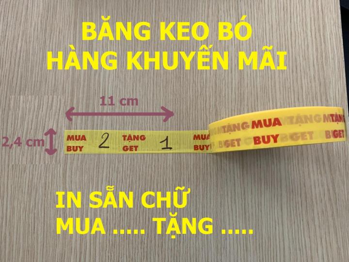 Lô 5 cuộn BĂNG KEO BÓ HÀNG KHUYỄN MÃI (in sẵn chữ MUA .... TẶNG... )