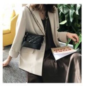 Black quilted crossbody shoulder bag