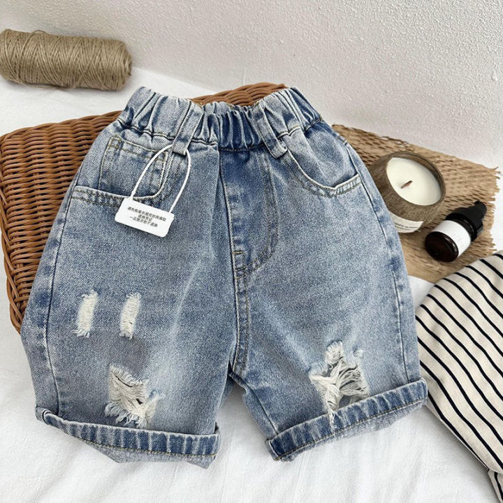 Quần short jean bé trai phong cách bụi bặm xanh sáng