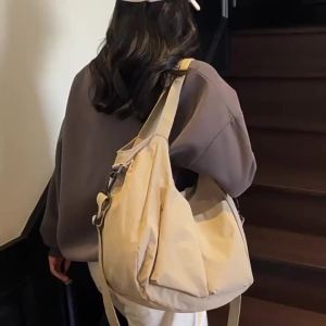 กระเป๋าใหม่ฤดูใบไม้ผลิและฤดูร้อน กระเป๋าสะพายไหล่ขนาดใหญ่ สไตล์เกาหลี กระเป๋าสะพายข้างขนาดใหญ่ สไตล์ชุดทำงาน กระเป๋าผ้าแคนวาส