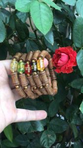 Vòng tay trầm hương tốc tự nhiên mix charm đá