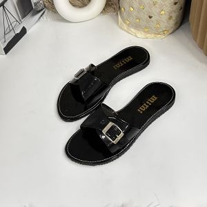 Black patent leather slide sandals with silver buckle and textured sole New Arrival