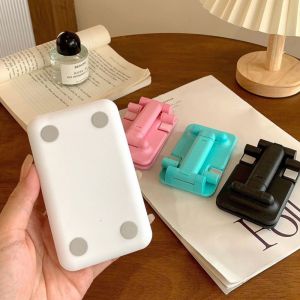 SeasTina สมาร์ทโฟนที่ตั้งโทรศัพท์บนโต๊ะพับได้ขี้เกียจขาตั้งแท็บเล็ตถ่ายภาพแบบพกพาถ่ายวิดีโอสมาร์ทโฟน