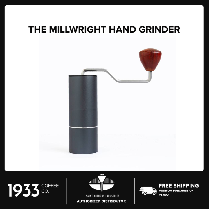 The millwright hand deals grinder