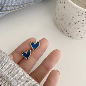 Gnker Heart Bling Zircon Stone Rose Gold Stud Earrings for Women Fashion Jewelry 2021 New Gift. Blue and white heart-shaped earrings with rose gold accents