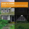 FAGUANGAO Dusk to Dawn LED Security Light,18W Plug in Flood Light Outdoor,5000k Daylight,1600lm, IP55 Waterproof,Adjustable 2 Heads Wall Light for Garage, Porch, Yard, Black. 