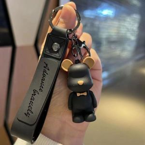 JOYNCLEON พวงกุญแจหมีที่น่ารักพร้อมสายรัดและจี้ห้อยคอน่ารักที่ทันสมัยสำหรับผู้หญิงของขวัญที่สมบูรณ์แบบสำหรับนักเรียนและคู่รัก