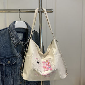 MOUSSON  กระเป๋าโท้ทสำหรับเดินทางสบายๆความจุขนาดใหญ่ใหม่สตรีทเทรนด์ตุ๊กตาลูกสุนัขสะพายไหล่คู่กระเป๋าอเนกประสงค์ใบใหญ่