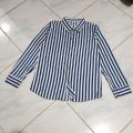 Kemeja Wanita Garis Hitam Putih Lengan Panjang Ganjar Pranowo Korean Style Kekinian Baju Motif Salur Black White Import Casual Pakaian Wanita  Blouse Stripe Oversize Jumbo Big Size Korea Style Terbaru Murah Katun Rayon Shakila Premium Hem Cewek Basic. 
