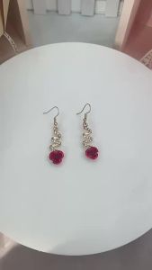 Fashionable and sophisticated trendy womens accessories: rose pendant earrings niche light luxury simple stud earrings