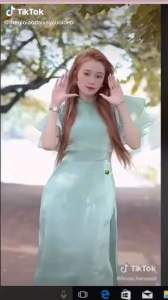 Áo dài xanh ngọc tay cánh tiên voan óng ánh 4 tà sang trọng