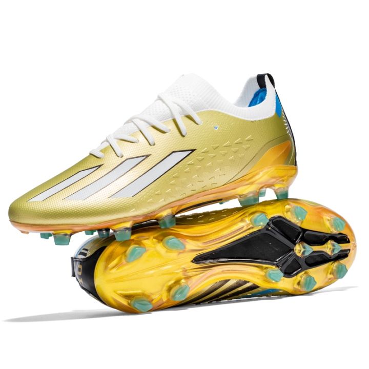 Gold football store boots kids