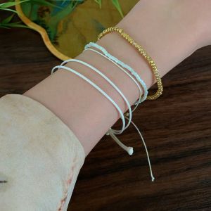 European and American new imitation jade beaded bracelet fashionable baroque imitation pearl multi-layer stacked rice bead elastic bracelet