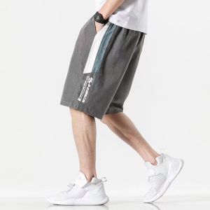 กางเกงขาสั้นผู้ชายฤดูร้อนกางเกงวิ่งตรงทุกการแข่งขันเอวยางยืดสไตล์ฮ่องกงหลวมสบายๆกีฬากางเกงห้าจุด