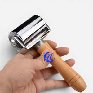 Cây lăn rulo kim loại ép bề mặt da khi dán keo